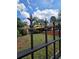 Yellow house behind a black metal fence with spear finials at 678 Quillian Ave, Decatur, GA 30032
