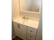 Modern bathroom vanity with gold accents at 895 Indian Lake Nw Dr, Lilburn, GA 30047