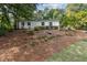 White house exterior with pine straw landscaping at 4405 Clack Rd, Auburn, GA 30011