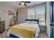 Bedroom with a comfy bed, hanging chair, and plenty of natural light at 975 Welch Sw St, Atlanta, GA 30310