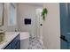 Main bathroom with freestanding tub, walk-in shower, and stylish tile at 975 Welch Sw St, Atlanta, GA 30310