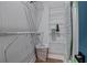Well-organized closet with wire shelving and hanging rods at 975 Welch Sw St, Atlanta, GA 30310