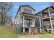 Charming two-story house with a front porch and walkway at 975 Welch Sw St, Atlanta, GA 30310