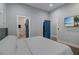 Main bedroom with ensuite bathroom and access to the hallway at 975 Welch Sw St, Atlanta, GA 30310