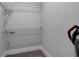 Small closet with wire shelving and a vacuum at 975 Welch Sw St, Atlanta, GA 30310