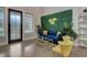 Living room featuring a green wall and modern furniture at 975 Welch Sw St, Atlanta, GA 30310