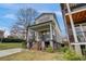 Two story home with front porch and landscaping at 975 Welch Sw St, Atlanta, GA 30310