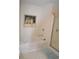 Bathroom with bathtub, shower, and plenty of light at 1007 Sycamore Ln, Villa Rica, GA 30180