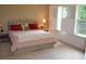 Spacious main bedroom with King-size bed and plenty of natural light at 1007 Sycamore Ln, Villa Rica, GA 30180