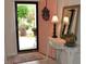 Bright and airy entryway with a console table, mirror, and a view to the front porch at 1007 Sycamore Ln, Villa Rica, GA 30180