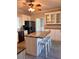 Spacious kitchen island with granite countertops and stainless steel appliances at 1950 Holland Park Dr, Buford, GA 30519