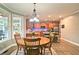 Bright breakfast nook area with a round table and view of the kitchen at 258 Chadwyck Ln, Canton, GA 30115