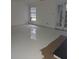 Spacious living room featuring a high-gloss white floor at 2968 Parc Lorraine, Lithonia, GA 30038