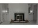 Living room with fireplace and glossy white floor at 2968 Parc Lorraine, Lithonia, GA 30038