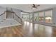 Open living room with hardwood floors and kitchen views at 1463 Edgemont Pt, Lawrenceville, GA 30044