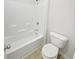 Clean bathroom with a tub and shower at 368 Madison Grace Ave, Mcdonough, GA 30252