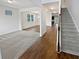 Spacious entryway with hardwood floors and views to the living and dining areas at 368 Madison Grace Ave, Mcdonough, GA 30252