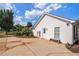 Backyard with concrete patio and storage shed at 110 Massey Ln, Locust Grove, GA 30248