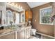 Bathroom with granite countertop, glass sink, and updated vanity at 110 Massey Ln, Locust Grove, GA 30248