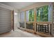 Screened porch with access to a wooded backyard at 608 Abingdon Way, Atlanta, GA 30328