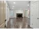 Living room with hardwood floors, fireplace, and built-ins at 608 Abingdon Way, Atlanta, GA 30328