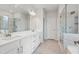 Double vanity bathroom with large shower and soaking tub at 6300 Misty Hill Ln, Buford, GA 30518