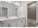 Bathroom boasts a double vanity and a shower/tub combo at 6300 Misty Hill Ln, Buford, GA 30518