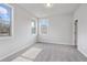 Spacious bedroom with neutral walls and carpeting at 6300 Misty Hill Ln, Buford, GA 30518