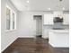 Bright dining area with hardwood floors and access to the kitchen at 6300 Misty Hill Ln, Buford, GA 30518