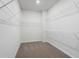 Large walk-in closet with wire shelving at 6300 Misty Hill Ln, Buford, GA 30518