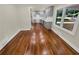 Modern kitchen with gray cabinets, quartz countertops, and hardwood floors at 1955 S Columbia Pl, Decatur, GA 30032