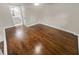 Spacious bedroom with hardwood floors and an ensuite bathroom at 1955 S Columbia Pl, Decatur, GA 30032