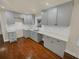 Modern kitchen with gray cabinets and white quartz countertops at 1955 S Columbia Pl, Decatur, GA 30032