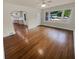Living room with hardwood floors and an open view of the kitchen at 1955 S Columbia Pl, Decatur, GA 30032