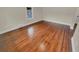 Empty bedroom with hardwood floors and neutral wall colors at 1955 S Columbia Pl, Decatur, GA 30032