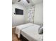 Bedroom with TV, ceiling fan, and patterned curtains at 3242 Bonway Dr, Decatur, GA 30032