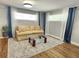 Spacious living area with hardwood floors and large windows at 3242 Bonway Dr, Decatur, GA 30032