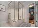 Bathroom with a large walk-in shower and tiled floor at 1170 Lowell Rd, Carrollton, GA 30116