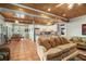 Open living space with kitchen, dining area, and wood ceiling at 1170 Lowell Rd, Carrollton, GA 30116