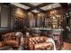 Wet bar with wine storage and custom cabinetry at 1170 Lowell Rd, Carrollton, GA 30116