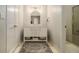 Bathroom with white vanity, marble countertop, and tiled floor at 1170 Lowell Rd, Carrollton, GA 30116