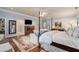 Spacious main bedroom with hardwood floors and large windows at 1170 Lowell Rd, Carrollton, GA 30116