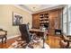 Bright home office with hardwood floors and built-in shelves at 1170 Lowell Rd, Carrollton, GA 30116
