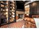Library with built-in shelves, fireplace, and hardwood floors at 1170 Lowell Rd, Carrollton, GA 30116