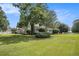 House exterior with a porch and manicured lawn at 1170 Lowell Rd, Carrollton, GA 30116