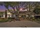 Ranch style home with large porch and mature trees at 1170 Lowell Rd, Carrollton, GA 30116