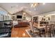 Open concept living area with hardwood floors and views of kitchen at 1170 Lowell Rd, Carrollton, GA 30116
