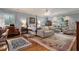 Main bedroom with hardwood floors, sitting area, and large windows at 1170 Lowell Rd, Carrollton, GA 30116