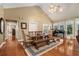 Bright dining room with hardwood floors and farmhouse style table at 1170 Lowell Rd, Carrollton, GA 30116