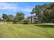 House exterior with a porch and manicured lawn at 1170 Lowell Rd, Carrollton, GA 30116